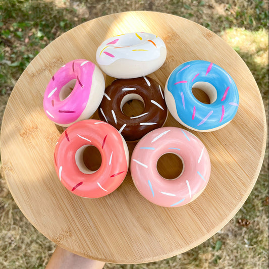 wooden donut toys on tray