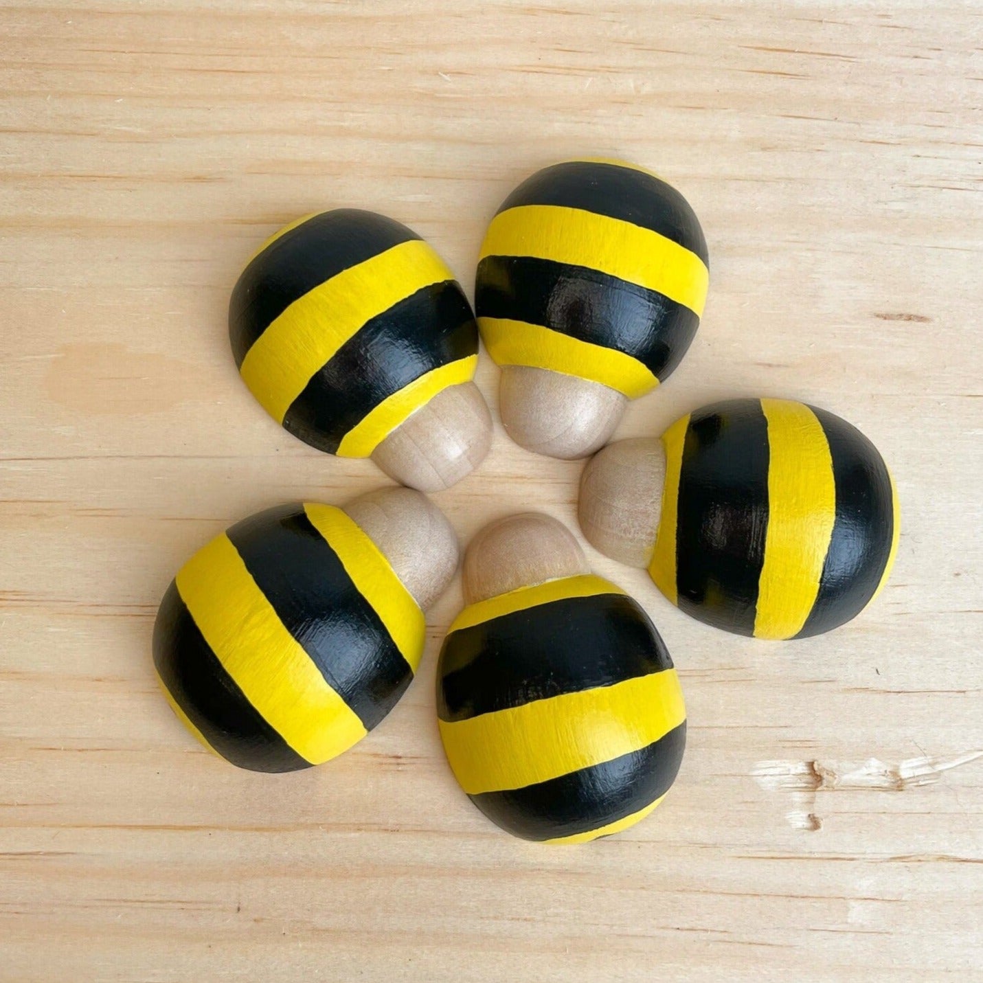 5 wooden bees